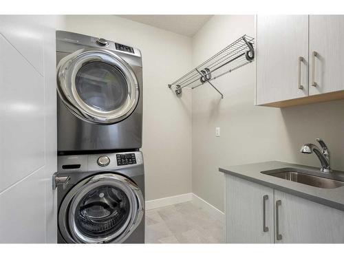 92 Burma Star Road Sw, Calgary, AB - Indoor Photo Showing Laundry Room