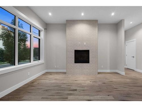 92 Burma Star Road Sw, Calgary, AB - Indoor With Fireplace