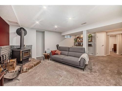 440 Parkview Crescent Se, Calgary, AB - Indoor Photo Showing Basement With Fireplace