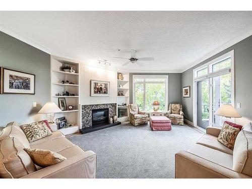 2308-24 Hemlock Crescent Sw, Calgary, AB - Indoor Photo Showing Living Room With Fireplace