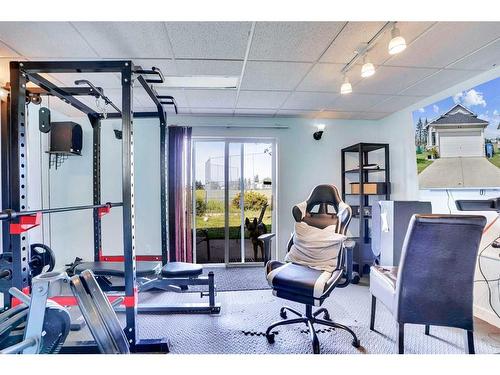 46 Anaheim Place Ne, Calgary, AB - Indoor Photo Showing Gym Room