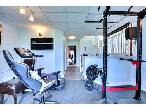 46 Anaheim Place Ne, Calgary, AB - Indoor Photo Showing Gym Room