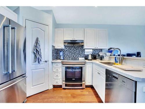 46 Anaheim Place Ne, Calgary, AB - Indoor Photo Showing Kitchen With Double Sink