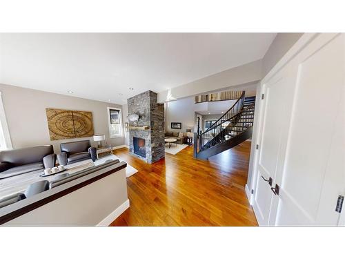 4628 Montgomery Avenue Nw, Calgary, AB - Indoor Photo Showing Other Room With Fireplace