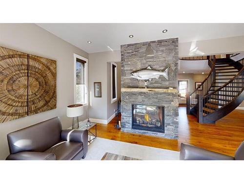 4628 Montgomery Avenue Nw, Calgary, AB - Indoor Photo Showing Living Room With Fireplace