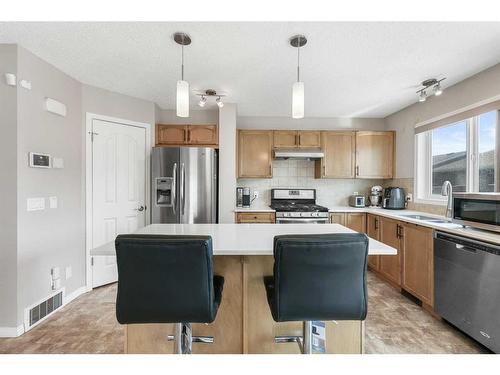 471 Auburn Bay Avenue Se, Calgary, AB - Indoor Photo Showing Kitchen With Stainless Steel Kitchen With Double Sink