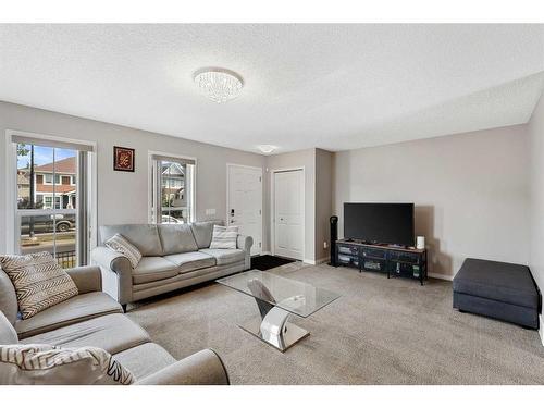 471 Auburn Bay Avenue Se, Calgary, AB - Indoor Photo Showing Living Room