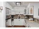 4407-1620 70 Street Se, Calgary, AB  - Indoor Photo Showing Kitchen With Double Sink 