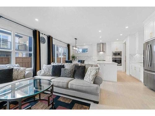 273 Ambleside Avenue Nw, Calgary, AB - Indoor Photo Showing Living Room