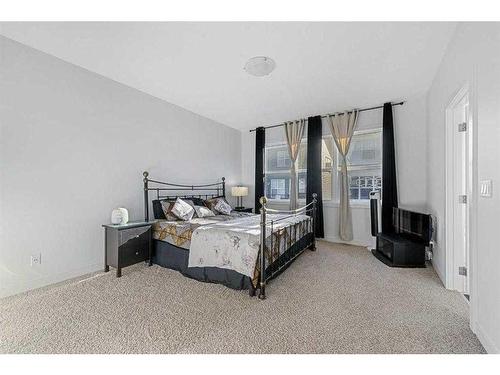 273 Ambleside Avenue Nw, Calgary, AB - Indoor Photo Showing Bedroom