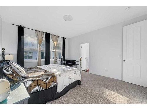 273 Ambleside Avenue Nw, Calgary, AB - Indoor Photo Showing Bedroom