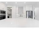 273 Ambleside Avenue Nw, Calgary, AB  - Indoor Photo Showing Kitchen With Stainless Steel Kitchen 