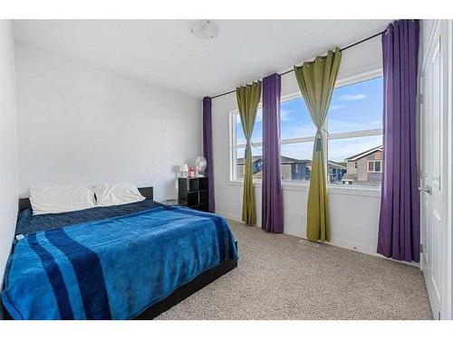 273 Ambleside Avenue Nw, Calgary, AB - Indoor Photo Showing Bedroom