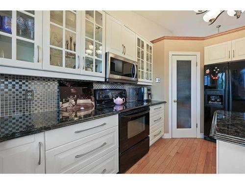 1711 Meadowlark Road Se, Airdrie, AB - Indoor Photo Showing Kitchen