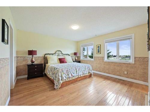 1711 Meadowlark Road Se, Airdrie, AB - Indoor Photo Showing Bedroom