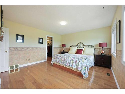 1711 Meadowlark Road Se, Airdrie, AB - Indoor Photo Showing Bedroom