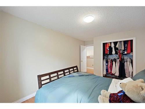 1711 Meadowlark Road Se, Airdrie, AB - Indoor Photo Showing Bedroom