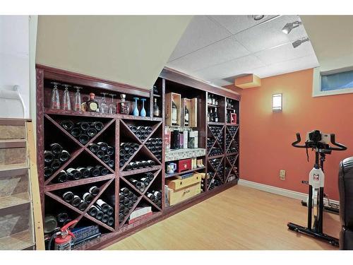 1711 Meadowlark Road Se, Airdrie, AB - Indoor Photo Showing Gym Room