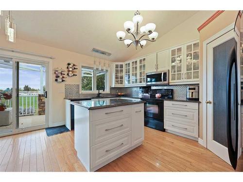 1711 Meadowlark Road Se, Airdrie, AB - Indoor Photo Showing Kitchen