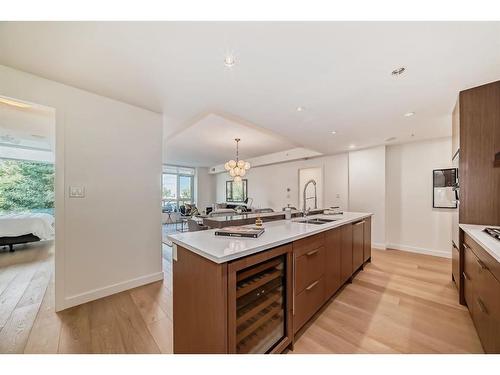 201-128 Waterfront Court Sw, Calgary, AB - Indoor Photo Showing Kitchen