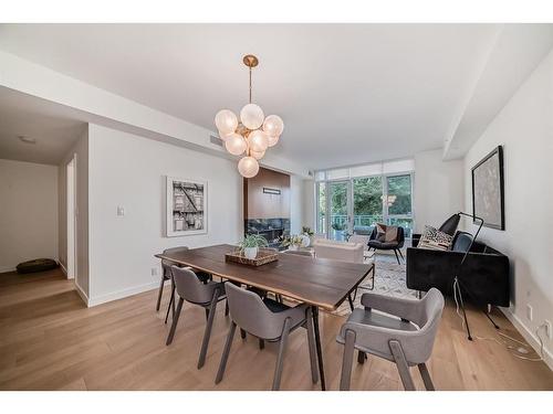 201-128 Waterfront Court Sw, Calgary, AB - Indoor Photo Showing Dining Room