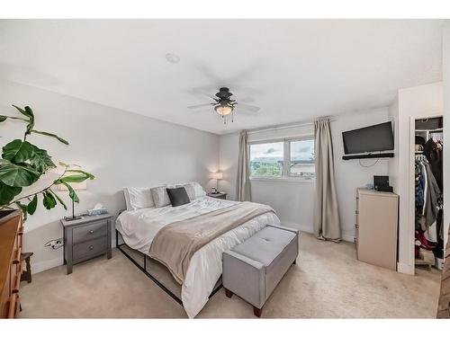 96 Glenhill Drive, Cochrane, AB - Indoor Photo Showing Bedroom