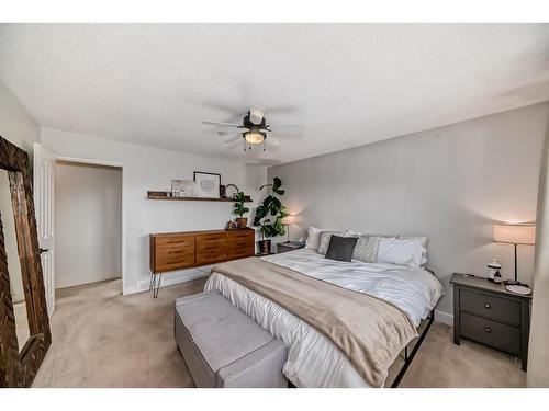 96 Glenhill Drive, Cochrane, AB - Indoor Photo Showing Bedroom