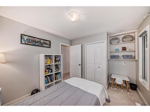 96 Glenhill Drive, Cochrane, AB - Indoor Photo Showing Bedroom