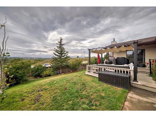 96 Glenhill Drive, Cochrane, AB - Outdoor With Deck Patio Veranda