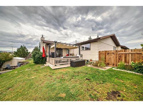 96 Glenhill Drive, Cochrane, AB - Outdoor With Deck Patio Veranda