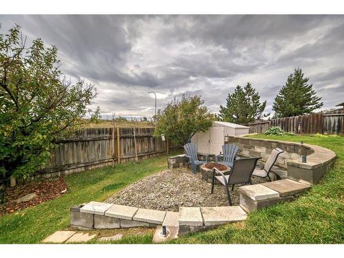 96 Glenhill Drive, Cochrane, AB - Outdoor With Deck Patio Veranda With Backyard