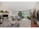 96 Glenhill Drive, Cochrane, AB  - Indoor Photo Showing Living Room 