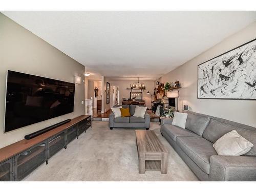 96 Glenhill Drive, Cochrane, AB - Indoor Photo Showing Living Room