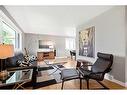 26 Wimbledon Crescent Sw, Calgary, AB  - Indoor Photo Showing Living Room 