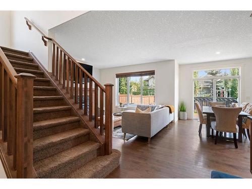 128 Elgin Estates Park Se, Calgary, AB - Indoor Photo Showing Living Room With Fireplace