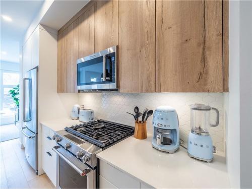 2909 22 Street Sw, Calgary, AB - Indoor Photo Showing Kitchen With Stainless Steel Kitchen With Upgraded Kitchen