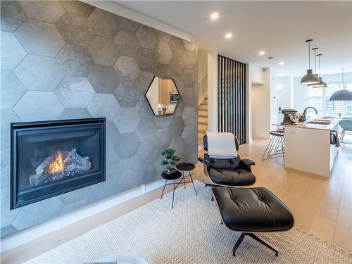 2909 22 Street Sw, Calgary, AB - Indoor Photo Showing Living Room With Fireplace