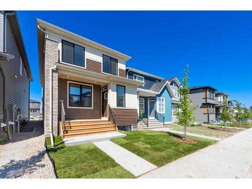 212 Lucas Common Nw, Calgary, AB - Outdoor With Facade