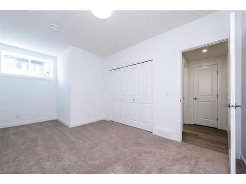 212 Lucas Common Nw, Calgary, AB - Indoor Photo Showing Other Room