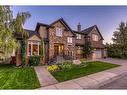 7029 Strathridge Gate Sw, Calgary, AB  - Outdoor With Facade 