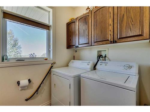 80024 249 Avenue East, Rural Foothills County, AB - Indoor Photo Showing Laundry Room