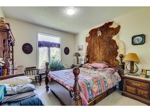 80024 249 Avenue East, Rural Foothills County, AB - Indoor Photo Showing Bedroom