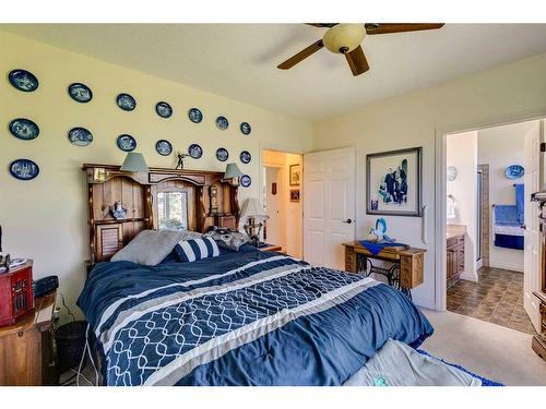 80024 249 Avenue East, Rural Foothills County, AB - Indoor Photo Showing Bedroom