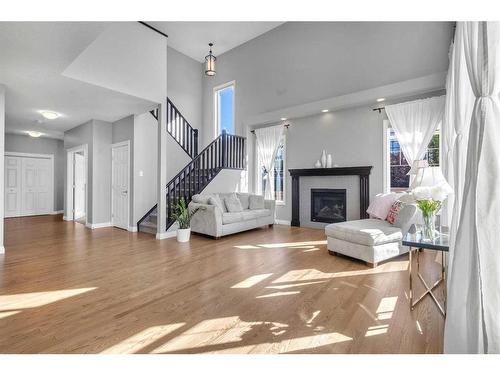 7 Evansborough View Nw, Calgary, AB - Indoor Photo Showing Living Room With Fireplace