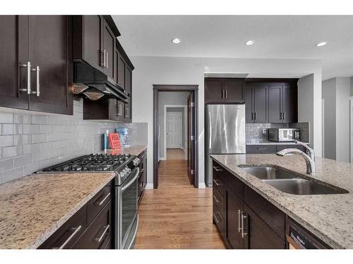 7 Evansborough View Nw, Calgary, AB - Indoor Photo Showing Kitchen With Stainless Steel Kitchen With Double Sink With Upgraded Kitchen