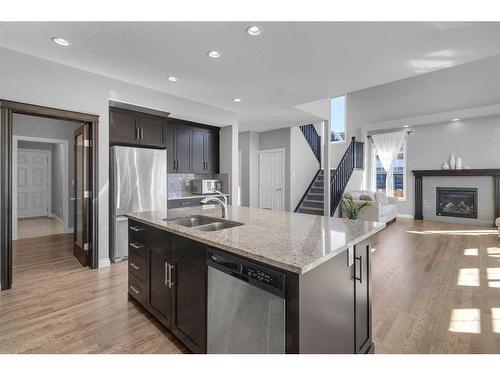 7 Evansborough View Nw, Calgary, AB - Indoor Photo Showing Kitchen With Stainless Steel Kitchen With Double Sink With Upgraded Kitchen