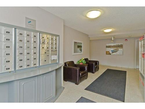 201-390 Marina Drive, Chestermere, AB - Indoor Photo Showing Other Room