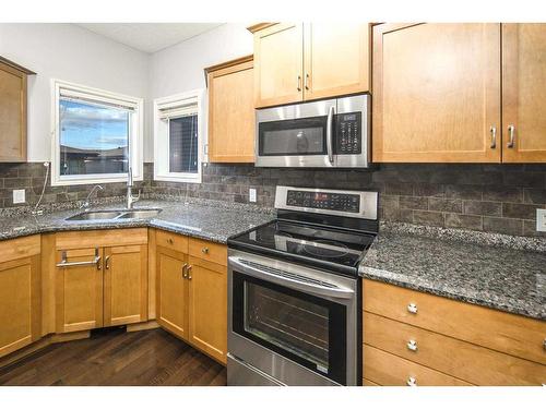 96 Aspen Hills Close Sw, Calgary, AB - Indoor Photo Showing Kitchen With Double Sink