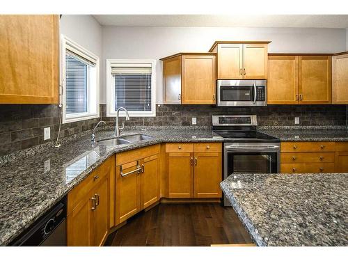 96 Aspen Hills Close Sw, Calgary, AB - Indoor Photo Showing Kitchen With Double Sink