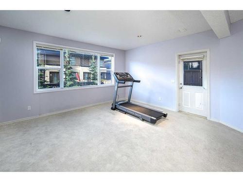 96 Aspen Hills Close Sw, Calgary, AB - Indoor Photo Showing Gym Room